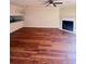 Spacious living room with fireplace and seamless flow to the modern kitchen at 4006 Bayside Cir, Atlanta, GA 30340