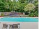 Community swimming pool with lounge chairs, perfect for relaxation and summer fun at 4006 Bayside Cir, Atlanta, GA 30340
