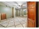 Large room features a ceiling fan, track lighting, built-in shelves, and mirrored closet doors at 4892 Duncan Dr, Powder Springs, GA 30127