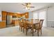 Inviting dining area featuring a wooden table set and a view of the kitchen at 4892 Duncan Dr, Powder Springs, GA 30127