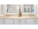 Elegant bathroom with double vanity, stone countertop, and white cabinets at 9860 Coleman Rd, Roswell, GA 30075