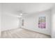 Bright bedroom with carpet, and large windows with natural light at 9860 Coleman Rd, Roswell, GA 30075