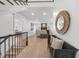 Bright and spacious living room with fireplace, hardwood floors, and modern furniture at 9860 Coleman Rd, Roswell, GA 30075