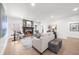 Cozy living room showcasing a stone fireplace and comfortable seating at 9860 Coleman Rd, Roswell, GA 30075