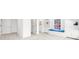 Bright living room with custom built-in shelves, storage, and a window seat at 9860 Coleman Rd, Roswell, GA 30075