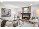Inviting living room with stone fireplace, bright windows, and stylish decor at 9860 Coleman Rd, Roswell, GA 30075
