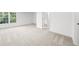 The bedroom is a bright airy room with a closet and ensuite bathroom at 9860 Coleman Rd, Roswell, GA 30075