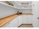 Pantry with custom shelving, drawers and butcher block countertop at 9860 Coleman Rd, Roswell, GA 30075