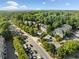 Aerial view of Bentley Place community with lush green trees and well-manicured lawns at 112 Bentley Pl, Tucker, GA 30084