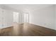 Bedroom with walk-in closet and hardwood flooring throughout at 112 Bentley Pl, Tucker, GA 30084