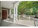 Charming unit entrance with a red door, covered porch, and well-kept exterior at 112 Bentley Pl, Tucker, GA 30084