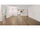 Bright living room featuring an open layout and light wood-look flooring at 112 Bentley Pl, Tucker, GA 30084