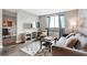 Well-lit living room with modern decor and comfortable seating at 215 Piedmont Ne Ave # 904, Atlanta, GA 30308