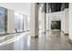 Bright lobby area with floor to ceiling windows at 215 Piedmont Ne Ave # 904, Atlanta, GA 30308