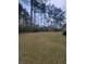 Large, well-maintained backyard with storage shed, mature trees, and full perimeter fence at 3348 Concord Se Cor, Conyers, GA 30013