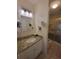 Bathroom featuring a granite vanity countertop and tile floor with a walk-in shower at 3348 Concord Se Cor, Conyers, GA 30013