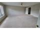 Spacious carpeted bedroom with natural light and ceiling fan at 3348 Concord Se Cor, Conyers, GA 30013