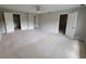 Expansive bedroom with multiple doors and neutral carpeting at 3348 Concord Se Cor, Conyers, GA 30013