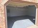 Spacious garage with ample storage, a service door, and an automatic door opener at 3348 Concord Se Cor, Conyers, GA 30013