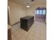 Kitchen featuring a central island and a view into an adjoining living space at 3348 Concord Se Cor, Conyers, GA 30013