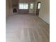 Spacious living room featuring a cozy brick fireplace and ample natural light at 3348 Concord Se Cor, Conyers, GA 30013