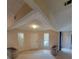 Bright living room with large windows and interesting architectural ceiling design elements at 3348 Concord Se Cor, Conyers, GA 30013