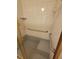 Bathroom featuring a shower with grab bars and a built-in seat at 3348 Concord Se Cor, Conyers, GA 30013