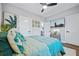 This bedroom offers a ceiling fan, an entertainment center with a big-screen TV and a cool design at 503 Mcwilliams Se Rd, Atlanta, GA 30315
