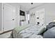 Bedroom featuring stylish furnishings, a ceiling fan and closet, as well as decor and wall art at 503 Mcwilliams Se Rd, Atlanta, GA 30315