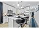 Modern kitchen with stainless steel appliances, island seating, and elegant finishes at 503 Mcwilliams Se Rd, Atlanta, GA 30315