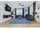 Modern living room with sleek furniture, a large TV, and stylish decor at 503 Mcwilliams Se Rd, Atlanta, GA 30315