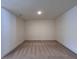 Large bonus room with carpeted floors and ample space for various activities at 1910 Victoria Way # 120, Conyers, GA 30013