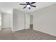 Spacious carpeted bedroom with ceiling fan and closet space at 3485 Walnut Rdg, Atlanta, GA 30349