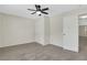 Bedroom with closet, neutral carpet, and ceiling fan at 3485 Walnut Rdg, Atlanta, GA 30349