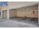Spacious three-car garage with ample storage space and neutral paint throughout at 3485 Walnut Rdg, Atlanta, GA 30349