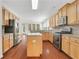 Well-equipped kitchen with stainless steel appliances, granite countertops, and hardwood floors at 3485 Walnut Rdg, Atlanta, GA 30349