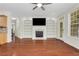 Spacious living room with fireplace and custom built-in shelving at 3485 Walnut Rdg, Atlanta, GA 30349