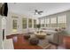 Cozy living room features hardwood floors, a fireplace, lots of natural light and neutral furniture at 3485 Walnut Rdg, Atlanta, GA 30349