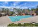 Community pool with a slide, cabana and plenty of trees for shade at 3485 Walnut Rdg, Atlanta, GA 30349