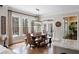 Dining area with natural light, views of trees and a picnic-style table at 12680 Old Surrey Pl, Roswell, GA 30075