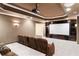 Home theater room with projector and screen, perfect for movie nights and entertaining guests at 12680 Old Surrey Pl, Roswell, GA 30075