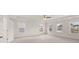 Spacious main bedroom has plush carpet, lots of natural light, and a ceiling fan at 13567 Tolstoy Drive, Covington, GA 30014