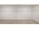 Empty walk-in closet with wire shelving perfect for staying organized at 13567 Tolstoy Drive, Covington, GA 30014