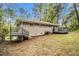 The home has a large private back yard, decks, neutral brick, and a private setting at 3656 Tulip Dr, Decatur, GA 30032