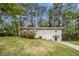 Charming split-level home featuring a freshly painted exterior and a well-manicured front yard at 3656 Tulip Dr, Decatur, GA 30032