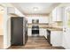 Well-lit kitchen area featuring stainless steel appliances and granite countertops at 3656 Tulip Dr, Decatur, GA 30032