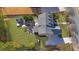 An aerial view showcases the property's layout, backyard, landscaping, patio and outdoor entertainment area at 3740 Williams Point Dr, Cumming, GA 30028