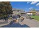 An outdoor living space offering seating, a fire pit, and a screened-in porch at 3740 Williams Point Dr, Cumming, GA 30028