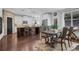 Eat-in kitchen with center island, stainless steel appliances, and hardwood floors at 3740 Williams Point Dr, Cumming, GA 30028