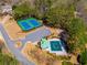 Community recreation with tennis courts, pool with a covered area, and dedicated parking spaces at 2025 Fairway Crossing Dr, Woodstock, GA 30188